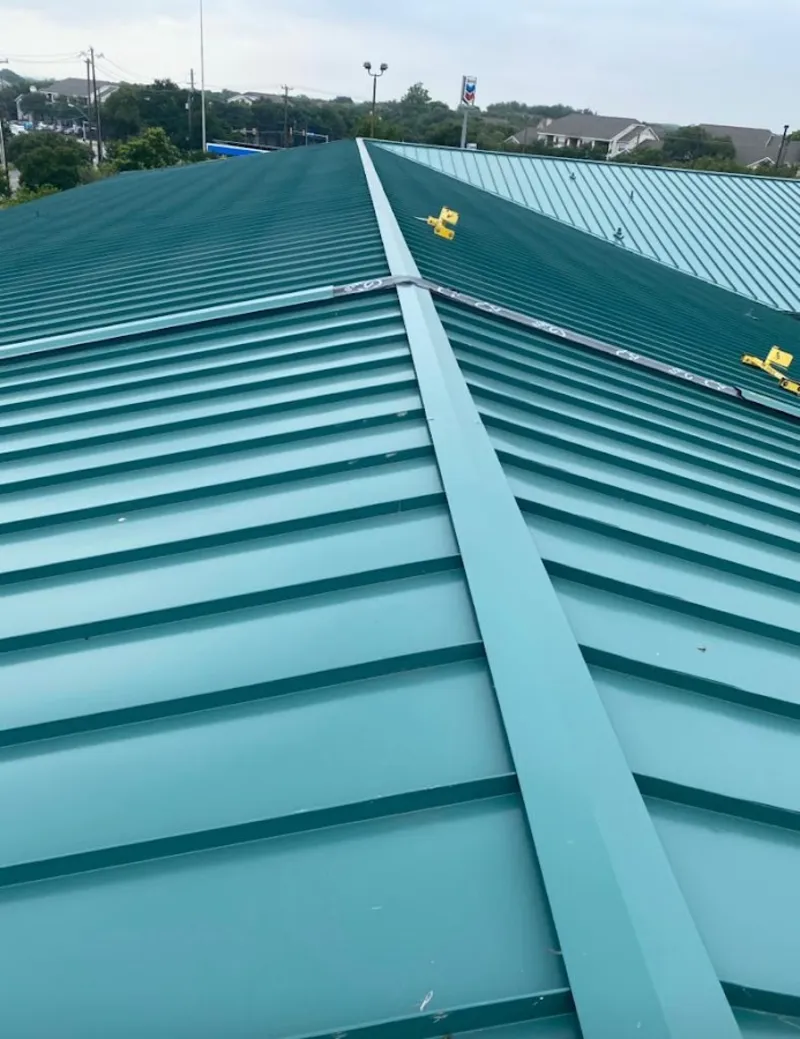 Green commercial metal roof ridge and valley for Metal Roof Repair in Minooka